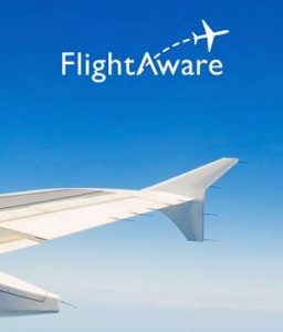 FlightAware app splash screen showing the wing of an airplane.